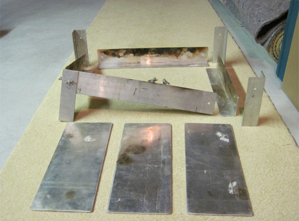 The individual pieces of the firepan.