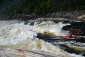 Jake Risch paddling a big rapid on the Moisie River in Quebec.