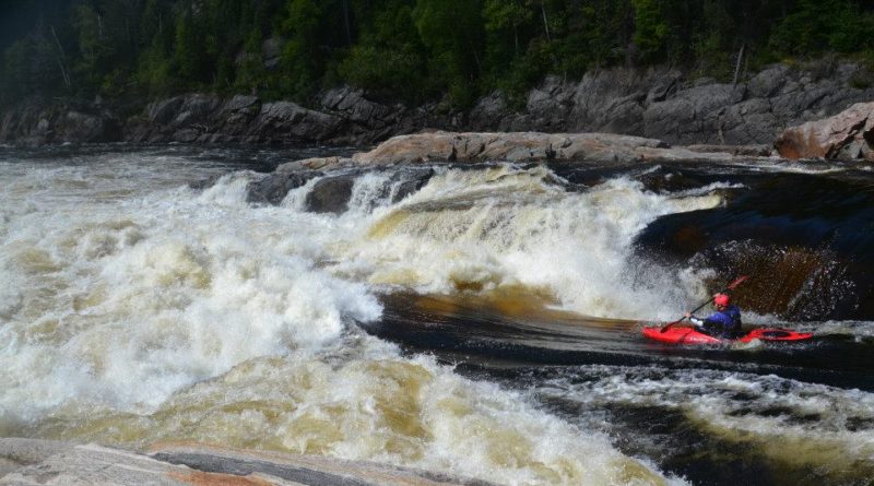 Jake Risch paddling a big rapid on the Moisie River in Quebec.