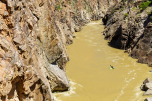 Kate Bowman walled in above Skull in Westwater Canyon on the Colorado River.