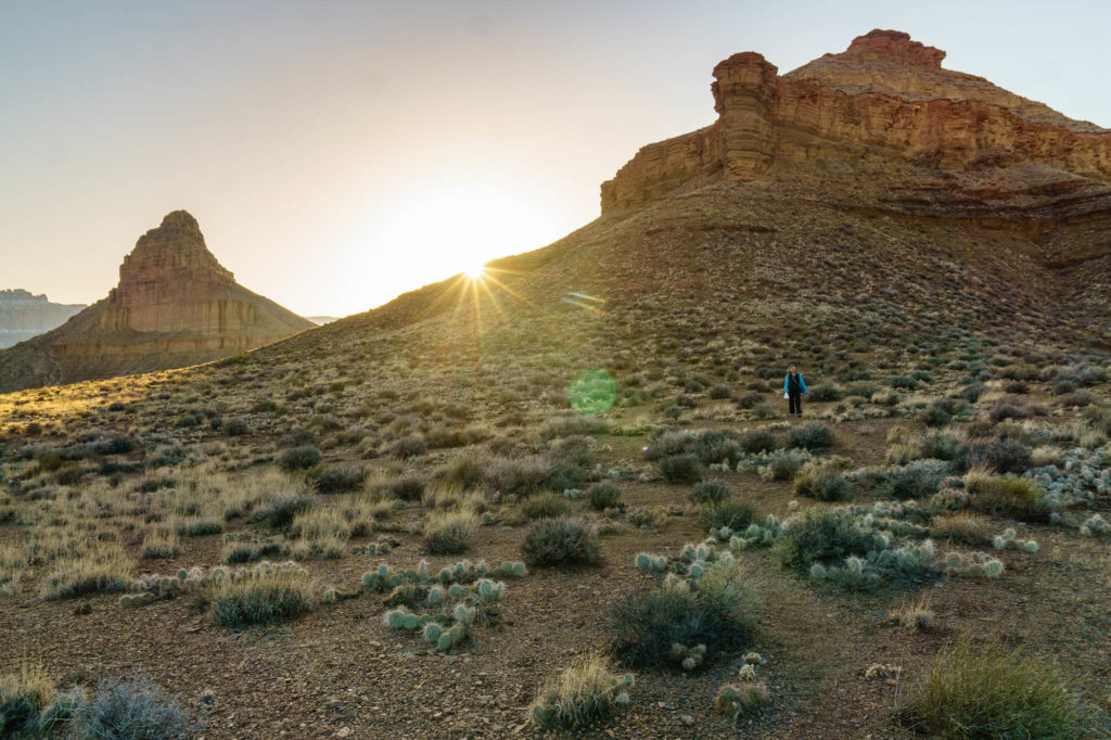 Jackie Selevan hikes back down to camp from the Tabernacle at sunset.