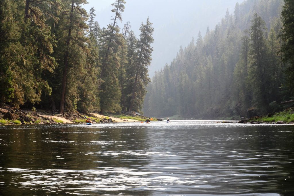 Paddling on a smoky morning on the Selway River in Idaho on a trip where we launched at low water on August 1.