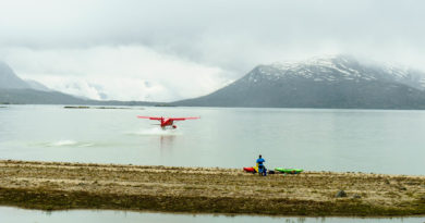 Malkolm Boothroyd watches the float plane land as it brings in our second group of paddlers.